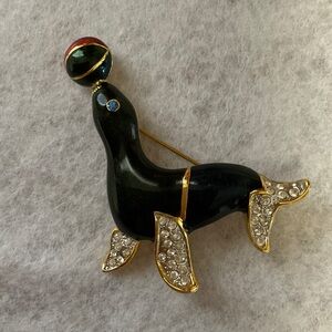 Seal Brooch with Red and Black Accents